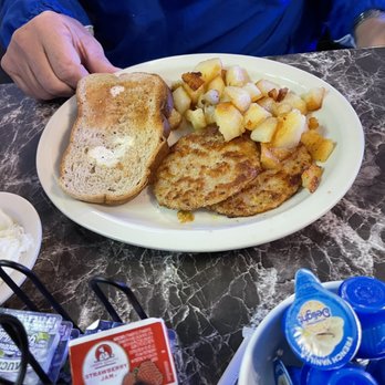 The Sheep Camp - Poached eggs sausage and home fries with rye toast - Breakfast & Brunch Near Me - Buckeye, Arizona The Sheep Camp - Poached eggs sausage and home fries with rye toast - Breakfast & Brunch Near Me - Buckeye, Arizona