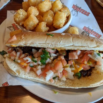 Hooters - Texas Cheesesteak with a side of tots. - Sports Bars Near Me - Etobicoke, Ontario
