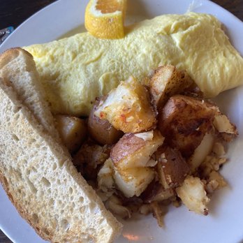 Famous Toastery - Avacado The Avocado Omelet - Breakfast & Brunch Near Me - Cary, North Carolina Famous Toastery - Avacado The Avocado Omelet - Breakfast & Brunch Near Me - Cary, North Carolina