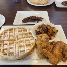 Buttermilk chicken and waffle, potatoes, beef bacon Buttermilk chicken and waffle, potatoes, beef bacon