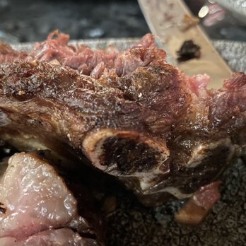 Lamplight Lounge - I forgot to take a shot before we dug in. Steak on the bone. Cooked perfectly - New American Near Me - Anaheim, California