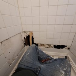 Gundersen Construction - Leaking tile shower surround
