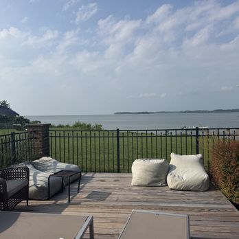The Laughing King - Looking out from the pool over the bay - Bed & Breakfast Near Me - Cape Charles, Virginia The Laughing King - Looking out from the pool over the bay - Bed & Breakfast Near Me - Cape Charles, Virginia