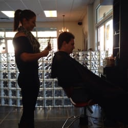 Twisted Strands Hair Studio - Cassandra cutting hubbys hair