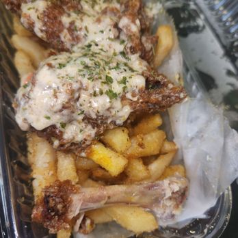 Cafe Curbside - These wings are extraordinary. Seasoned overnight being cook and slathered in more garlic parmesan seasoning. Lots of fries, hand cut.. - Sandwiches Near Me - Capitol Heights, Maryland