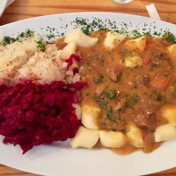 Cafe Polonia - Potato dumplings with cabbage and sauerkraut! - Polish Near Me - Boston, Massachusetts Cafe Polonia - Potato dumplings with cabbage and sauerkraut! - Polish Near Me - Boston, Massachusetts
