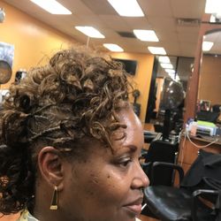 Mohawk with twist and spiral curls