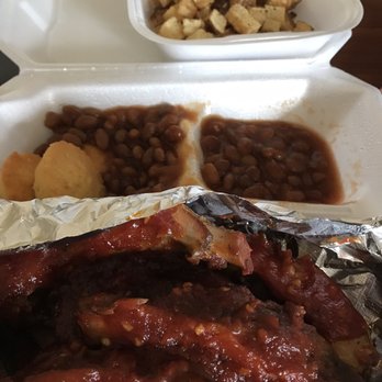 Lackey Sauce BBQ - Half rack of babyback ribs with spicy bbq sauce, beans, and side of fries - Barbeque Near Me - Yorktown, Virginia Lackey Sauce BBQ - Half rack of babyback ribs with spicy bbq sauce, beans, and side of fries - Barbeque Near Me - Yorktown, Virginia