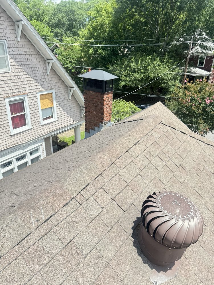 Slide of Mosaic Roofing Company