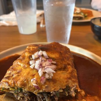 La Perla Tapatía Mexican Restaurant - Birria burrito cut in half - Latin American Near Me - Eustis, Florida