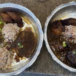 Left = goat curry and jerk chicken combo. Right = oxtail and jerk chicken combo.