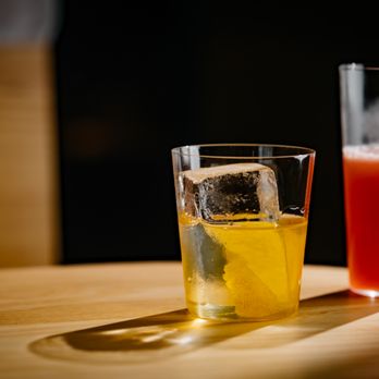 Bar Agricole - a glass of orange juice and a glass of orange juice - Bars Near Me - San Francisco, California Bar Agricole - a glass of orange juice and a glass of orange juice - Bars Near Me - San Francisco, California