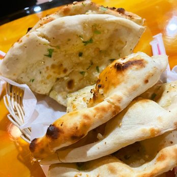 Tandoori Hut Indian Restaurant & Catering - Garlic naan - Indian Near Me - Houston, Texas Tandoori Hut Indian Restaurant & Catering - Garlic naan - Indian Near Me - Houston, Texas