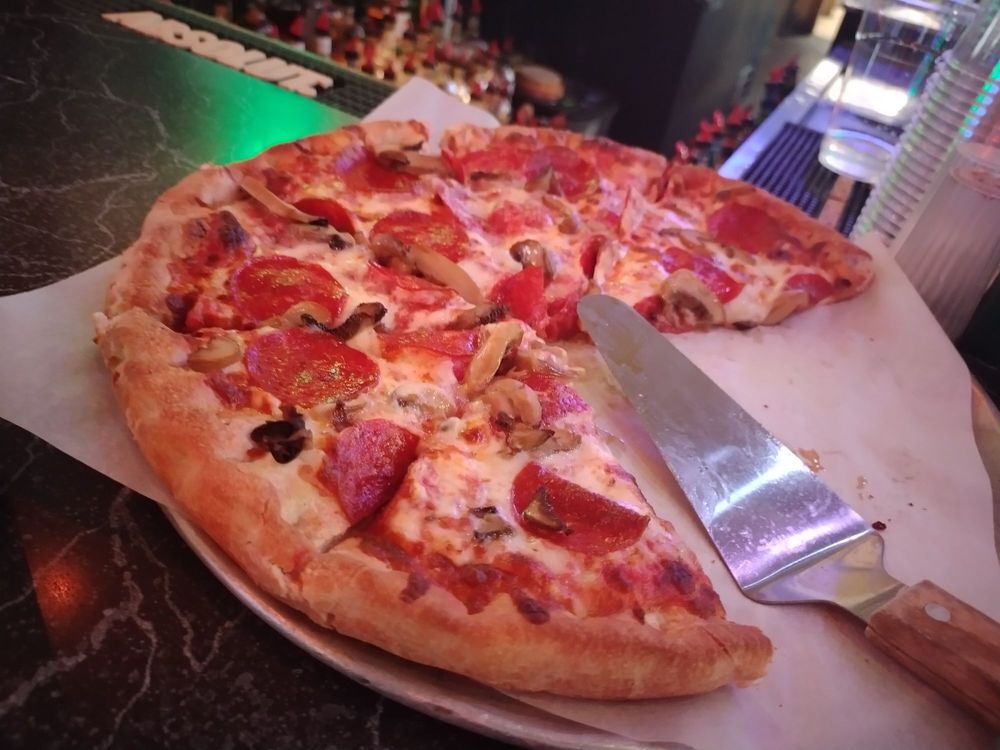 Geppetto's Pizza & Ribs Logo