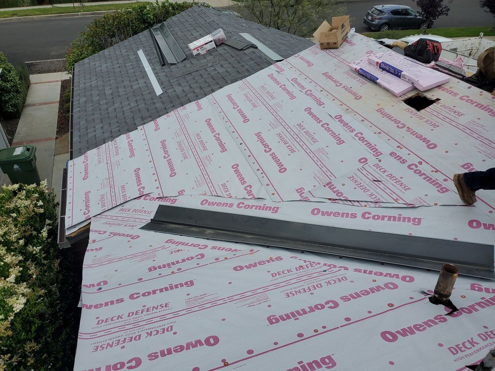 Slide of Trujano Roofing