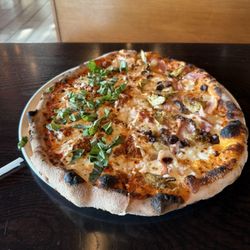 Mika’s Neapolitan Pizza - Half Bolognese Pizza and half Capricciosa pizza.