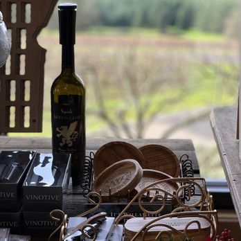 Willamette Valley Vineyards - a bottle of wine on a table - Wineries Near Me - Turner, Oregon Willamette Valley Vineyards - a bottle of wine on a table - Wineries Near Me - Turner, Oregon