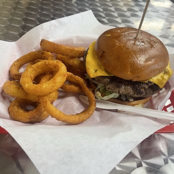 Zac's Philly Steaks and Shakes - Double cheeseburger with onion rings. - Cheesesteaks Near Me - Lancaster, Texas Zac's Philly Steaks and Shakes - Double cheeseburger with onion rings. - Cheesesteaks Near Me - Lancaster, Texas