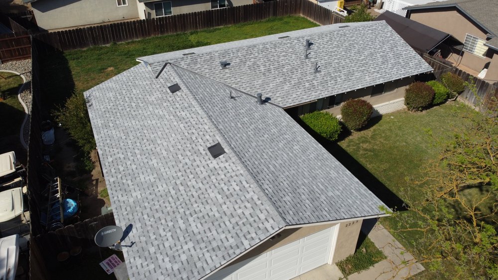 Slide of Econo Roofing