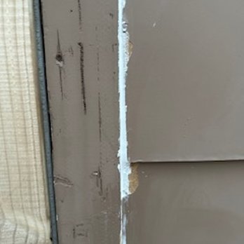 Best Address - poorly applied caulk and wrong color to boot - Painters Near Me Best Address - poorly applied caulk and wrong color to boot - Painters Near Me