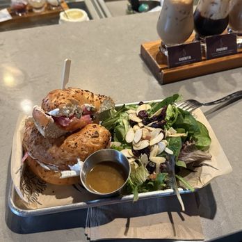 Fair Trade Cafe - Salmon bagel with side salad - Coffee & Tea Near Me - Phoenix, Arizona Fair Trade Cafe - Salmon bagel with side salad - Coffee & Tea Near Me - Phoenix, Arizona