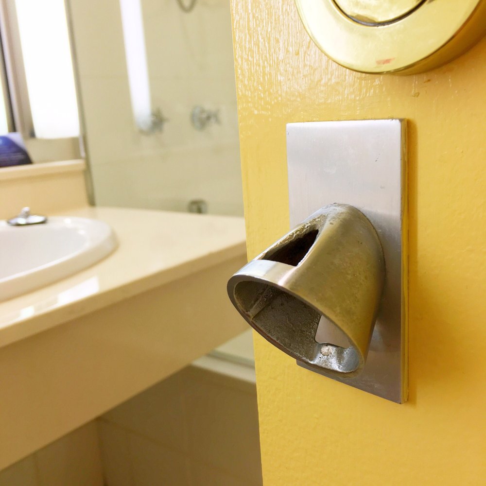 Wrest Point - Door based bottle opener on the inside of the bathroom door - not something you see too often these days in an up market Casino Hotel - Hotels Near Me - Sandy Bay, TAS