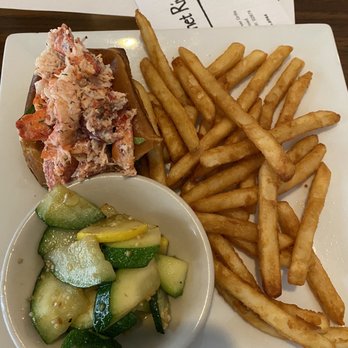 Sakonnet River Grille - Lobster roll with vegetable medley instead of coleslaw. This was half the portion - split between sister and I. - New American Near Me - Tiverton, Rhode Island Sakonnet River Grille - Lobster roll with vegetable medley instead of coleslaw. This was half the portion - split between sister and I. - New American Near Me - Tiverton, Rhode Island