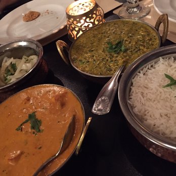 Bombay River - Clockwise from top left: seasoned raw onions, methi malai mutter, rice, and paneer korma - Indian Near Me - Red Bank, New Jersey Bombay River - Clockwise from top left: seasoned raw onions, methi malai mutter, rice, and paneer korma - Indian Near Me - Red Bank, New Jersey