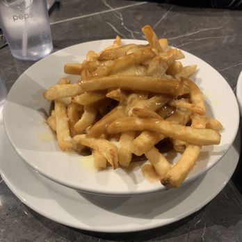 Castle John's Pub - Classic poutine. The gravy is too salty. - Pubs Near Me - Newmarket, Ontario