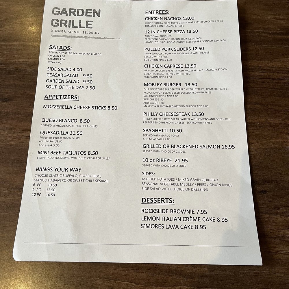 Garden Grille - a menu on a wooden table - New American Near Me - Hurst, Texas Garden Grille - a menu on a wooden table - New American Near Me - Hurst, Texas
