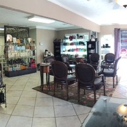 Salon Bellage - When you walk in its a warm atmosphere to relax after work by the fireplace or watch the tv or possibly read the newest fashion magazine.
