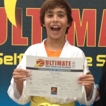 Z-Ultimate Self Defense Studio - My son Nico was proud to earn his yellow belt. He's now 2 ranks higher at purple!!! - Martial Arts Near Me - Carlsbad, California