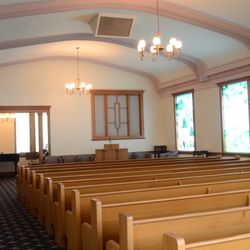 Larkin Mortuary - The chapel at Larkin Mortuary in downtown Salt Lake City, with its original wooden pews, vaulted ceiling and stained-glass wi...