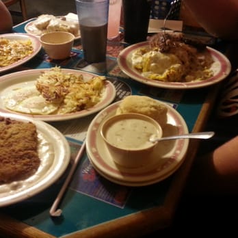 Cope's Knotty Pine Cafe - Front and center is the chicken fried steak. To the left western skillet and finally to the left an omelet. - Breakfast & Brunch Near Me - Bakersfield, California Cope's Knotty Pine Cafe - Front and center is the chicken fried steak. To the left western skillet and finally to the left an omelet. - Breakfast & Brunch Near Me - Bakersfield, California