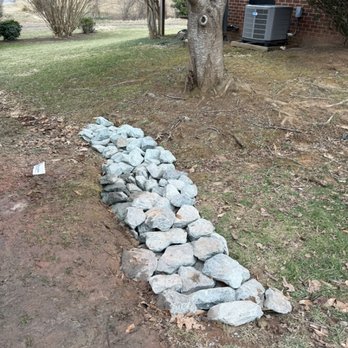 Greater Days - Water drainage with stones - Landscaping Near Me Greater Days - Water drainage with stones - Landscaping Near Me
