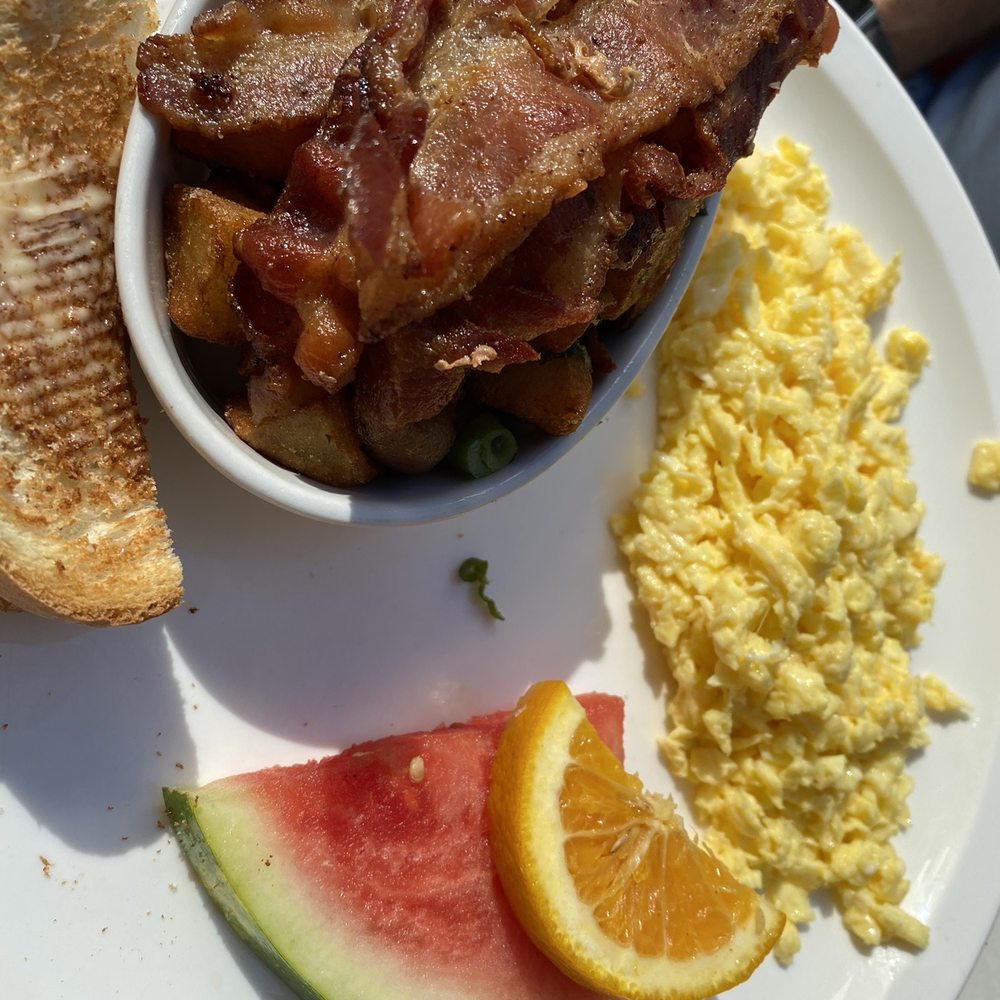 Eggs with bacon on the side.