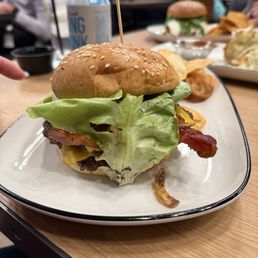 Western Burger Double smash, cheddar, bacon, house-pickled jalapeno, crispy onions, Mucky Duck BBQ, lettuce, tomato, sesame bun Western Burger Double smash, cheddar, bacon, house-pickled jalapeno, crispy onions, Mucky Duck BBQ, lettuce, tomato, sesame bun