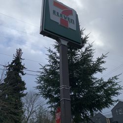 7-Eleven - Sign by the road, Monday 13 November 2023.