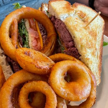 Turnpike’s Neighborhood Restaurant - A double decker roast beef with onion rings. Huge portion and pretty tasty - Hot Dogs Near Me - Spring Hill, Florida Turnpike’s Neighborhood Restaurant - A double decker roast beef with onion rings. Huge portion and pretty tasty - Hot Dogs Near Me - Spring Hill, Florida