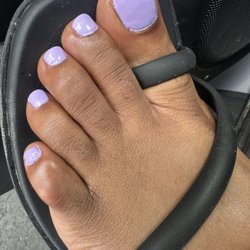 9 Nails - Gel pedicure. Look at the pinky toe! Overall, this isn't quality work.