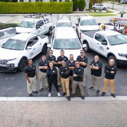 Pest Brothers - Team photo with our entire fleet and team