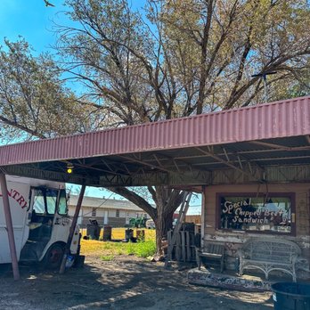 Powell's Country Bar-B-Q Logo