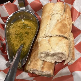 Zuckerello's - Bread for the table with garlicky oil - Italian Near Me - Fort Lauderdale, Florida Zuckerello's - Bread for the table with garlicky oil - Italian Near Me - Fort Lauderdale, Florida