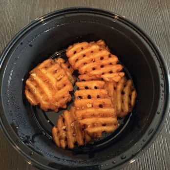 Basil's Italian - Order of waffle fries.  This was right after I opened the container before we had the few fries that were included. - Italian Near Me - Gretna, Nebraska