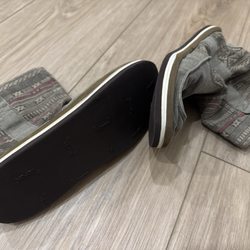 La Belle's Shoe Repair - Replaced entire soles & patched a hole in the side.
