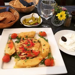 Kalamaras Restaurant - Chicken lemonoreganato & tzatziki w/ pita.  I cleaned my plate I'm stuffed!