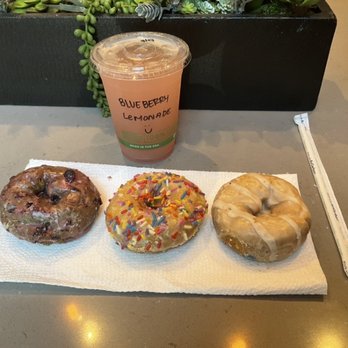 Mighty-O Donuts - Blueberry Lemonade/ Blueberry Monster/ Sprinkles/ Good Ol Glazed - Donuts Near Me - Seattle, Washington Mighty-O Donuts - Blueberry Lemonade/ Blueberry Monster/ Sprinkles/ Good Ol Glazed - Donuts Near Me - Seattle, Washington