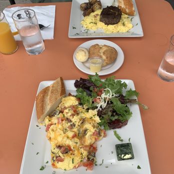 Starling Diner - Roma Tomato, Applewood Bacon and Cheddar Scramble with a side of greens instead of potatoes for me. - New American Near Me - Long Beach, California