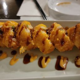 One of the specialty sushi rolls. One of the specialty sushi rolls.