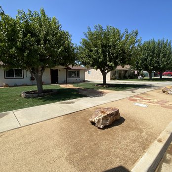 Ledesma’s Lawn Services - a large rock in the middle of a driveway - Landscaping Near Me Ledesma’s Lawn Services - a large rock in the middle of a driveway - Landscaping Near Me